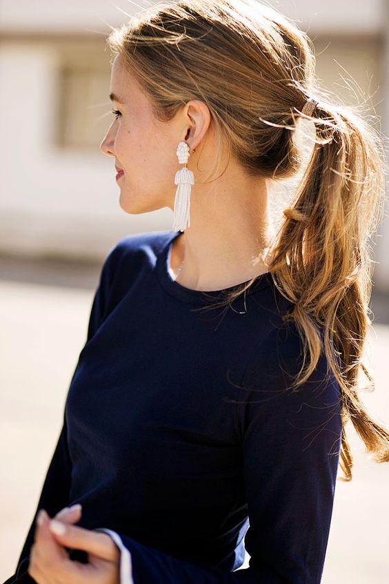 Statement earrings & Ponytail.