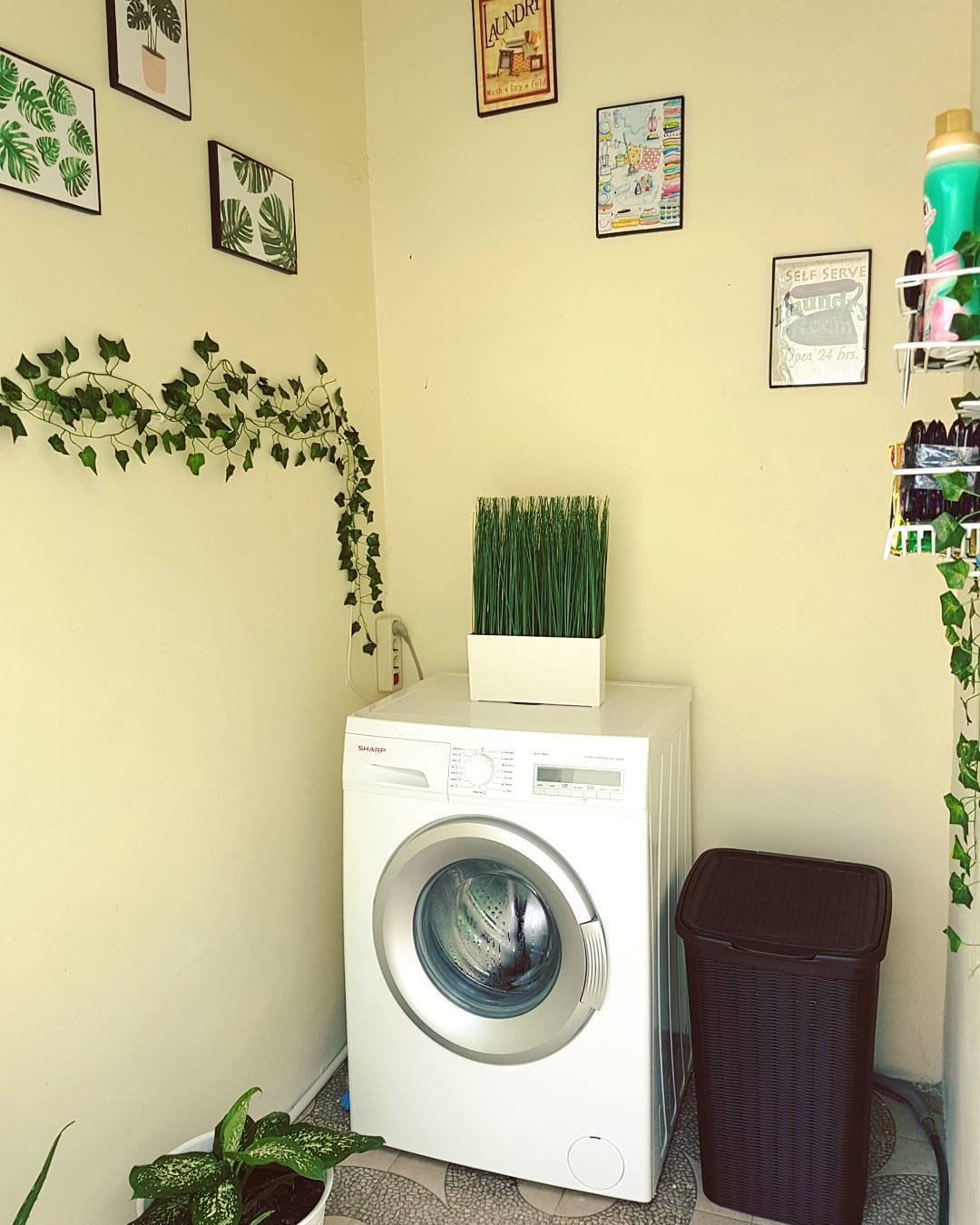 Utilize an empty space under a water reservoir into a ketchy laundry room