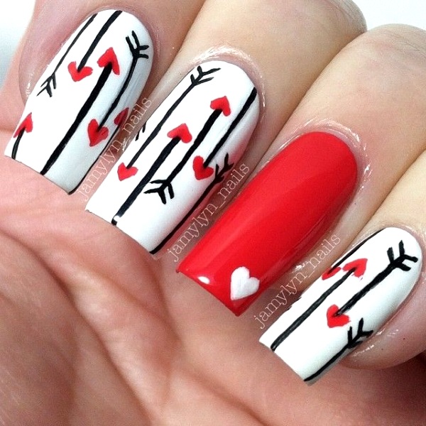 Arrows and hearts nail design