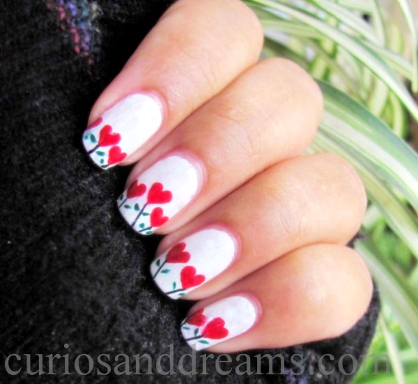 Heart flowers Valentines nail design are simple, yet attractive!