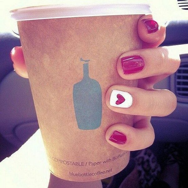 Simple Red Manicure With White Heart Accent Nail