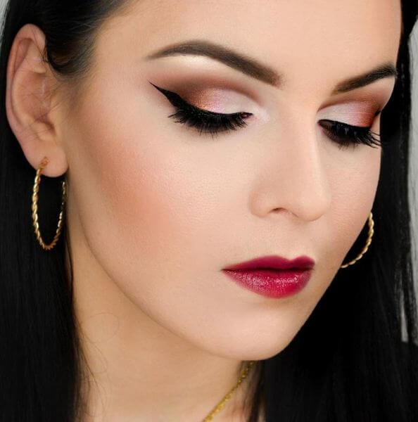 Make a statement with a smokey eye cut crease and bold winged liner.