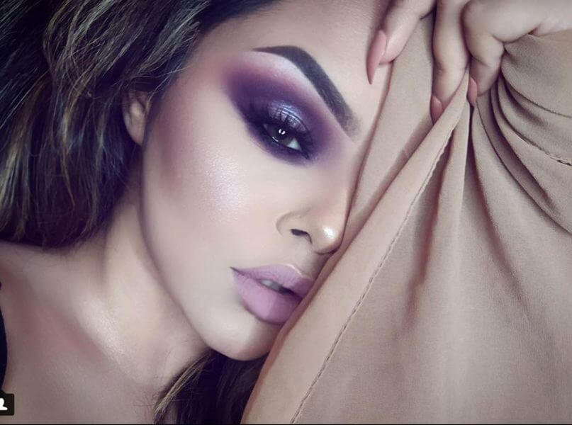 Purple smokey eyes look incredibly sexy on brown eyes.