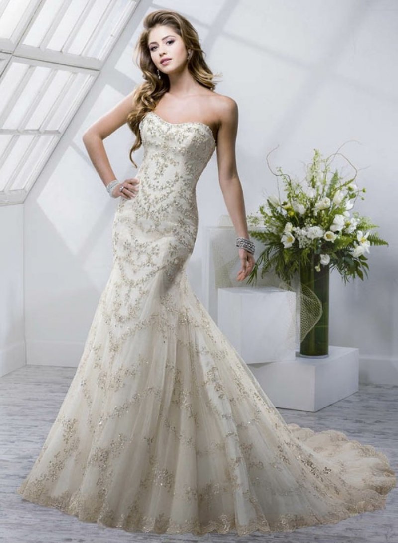 #Champagne #Wedding #Dresses Elegant design of the slender image of a champagne bridal gown