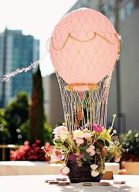 #Wedding #Decoration #Balloons Hot air balloon style wedding table centerpiece made of a basket of words and balloons