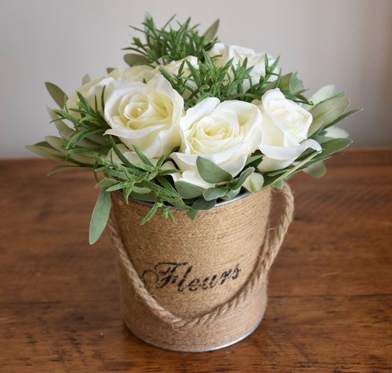 Pretty cream silk roses floral arrangement