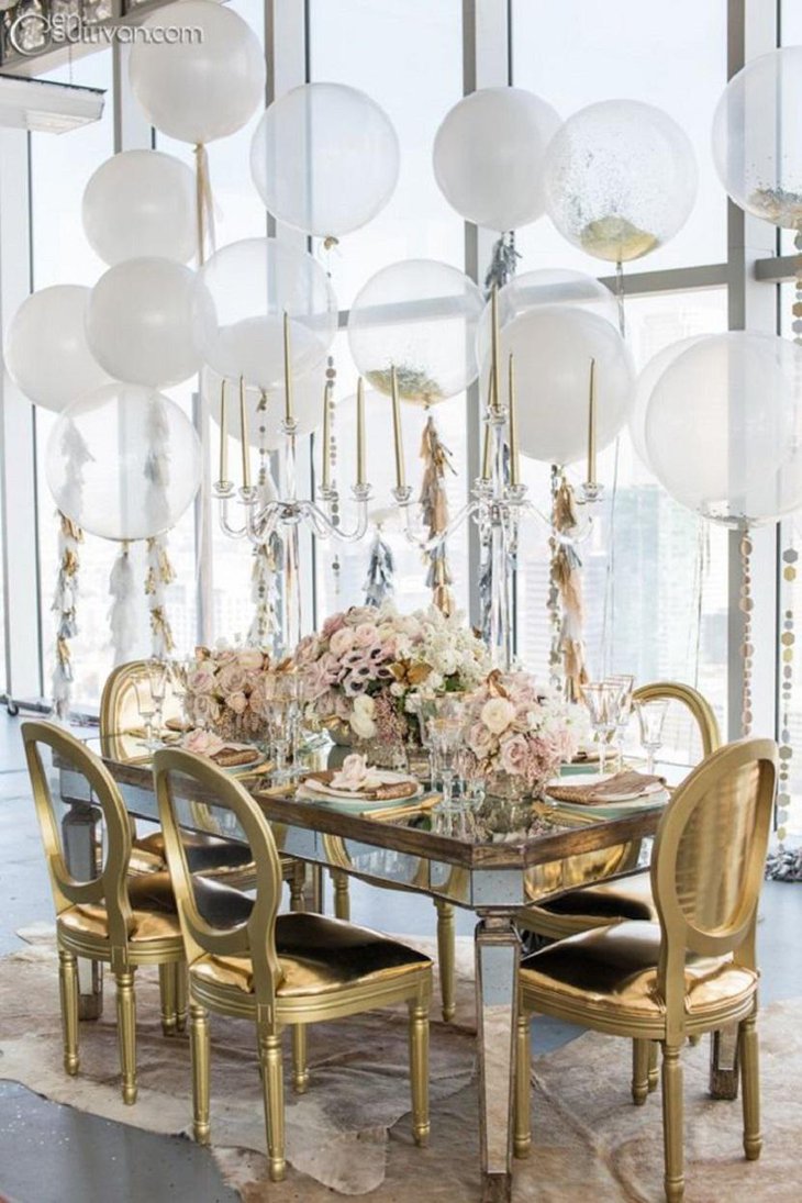 White Ghost Balloons with Golden Tassels at Golden Décor Table