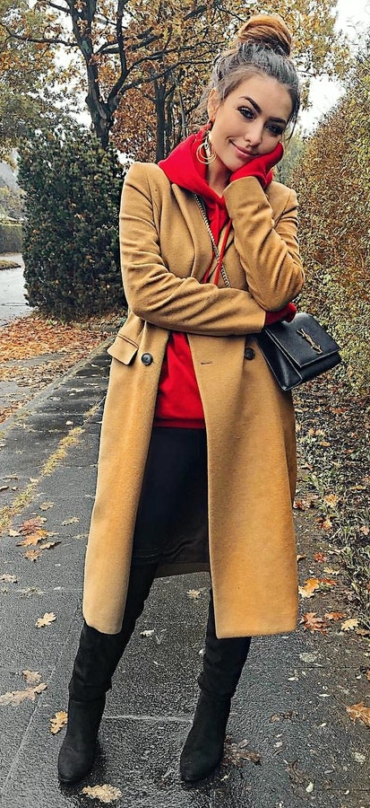 Trendy women's brown trench coat.