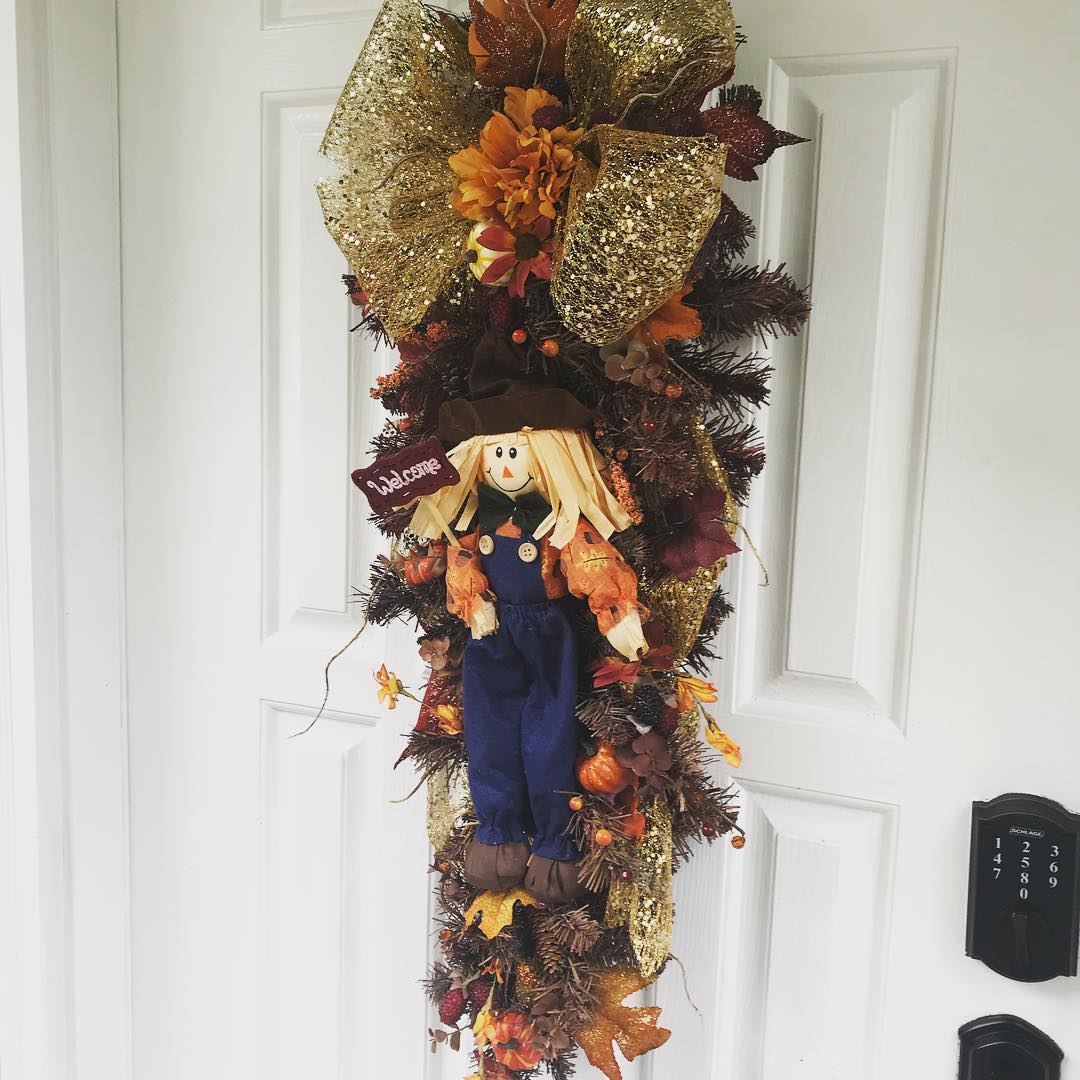 Welcome Fall to your front door with this adorable Scarecrow Swag.