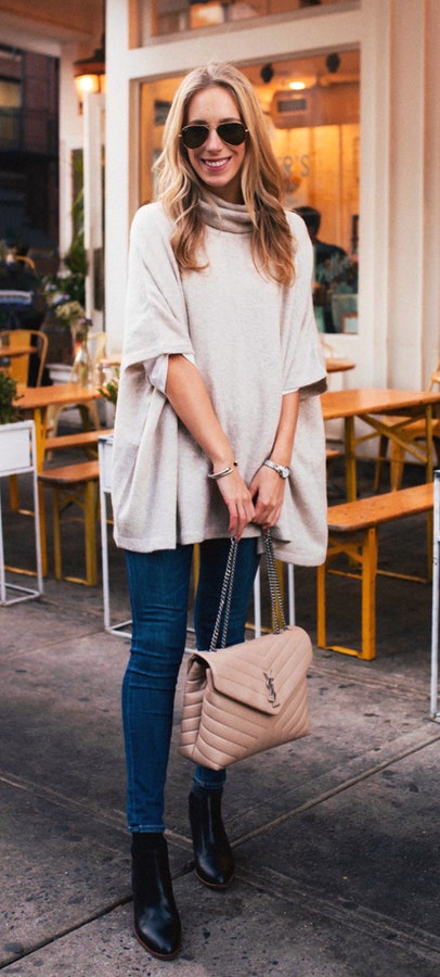 Women's beige turtle neck cardigan.