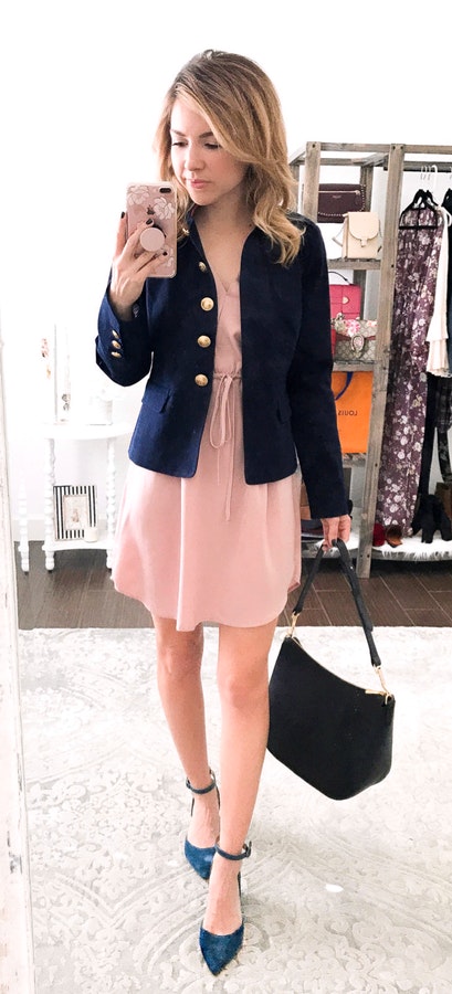 Women's black blazer and pink dress.