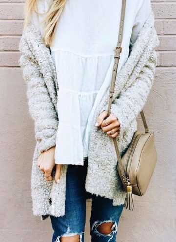 Women's crew-neck white top with grey cardigan.