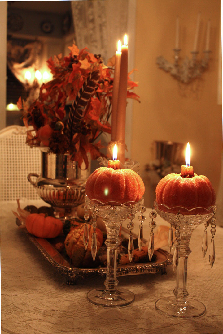 A craft pumpkin and use a tall candle for your Halloween table.