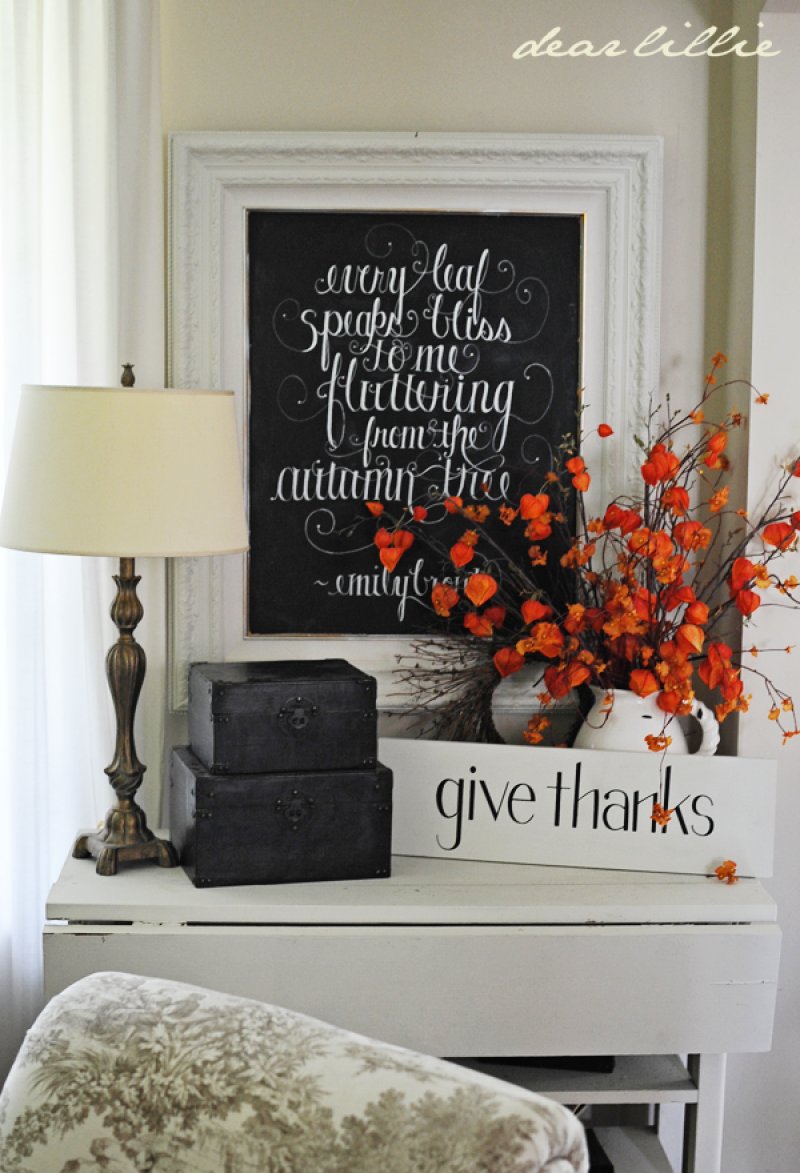 Black and White Mantel Decor with Studding Red Foliage Accent.