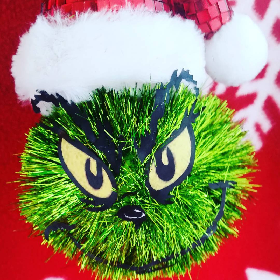 A grinch christmas ornament.