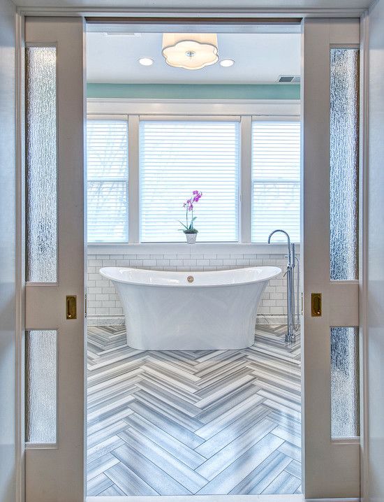Beautiful Herringbone Tile in the Bathroom Decor.