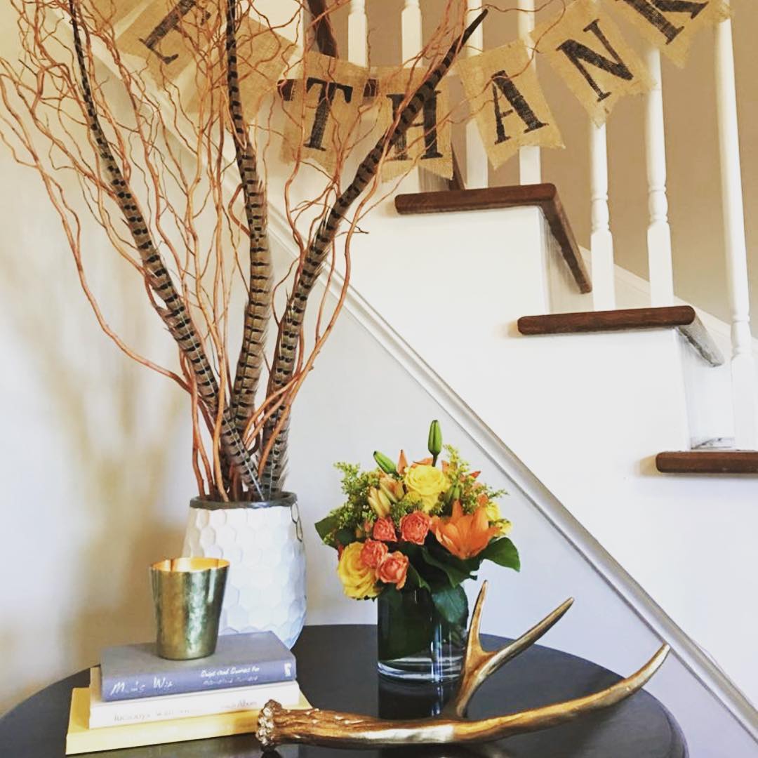 Entry table decor with the seasons.