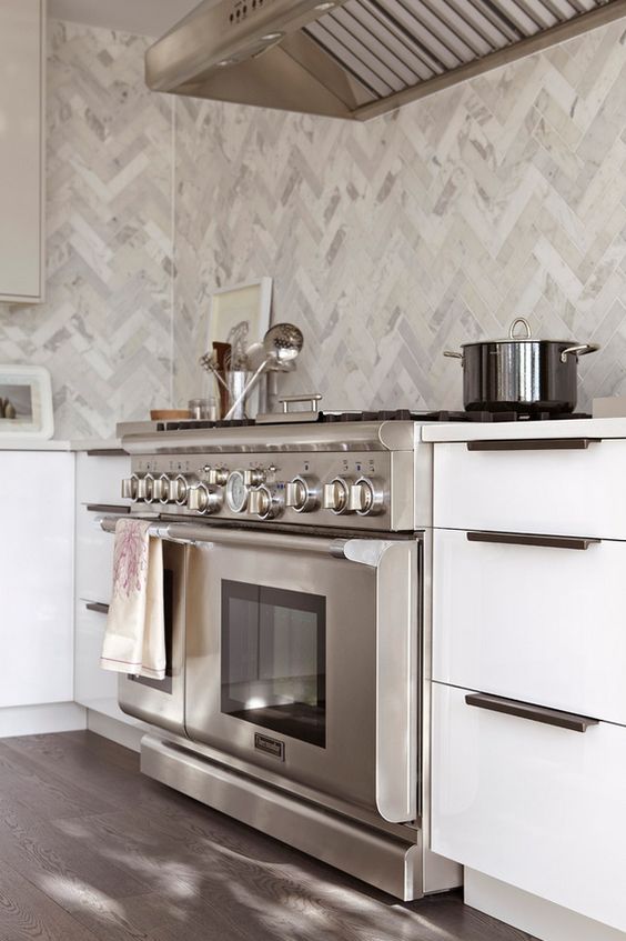 Herringbone Tile on Kitchen Wall.