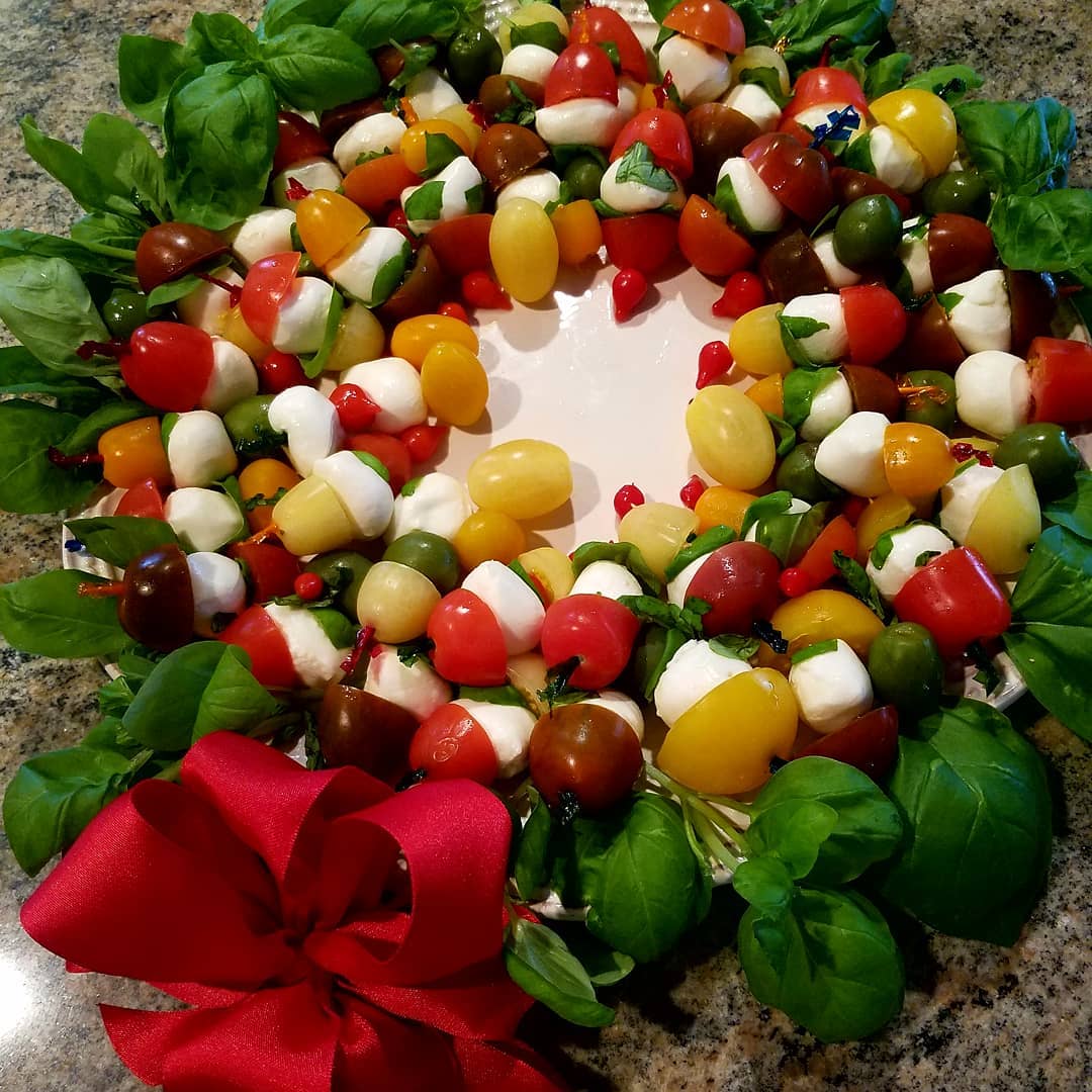 Mozzarella tomato and basil edible Christmas wreath.