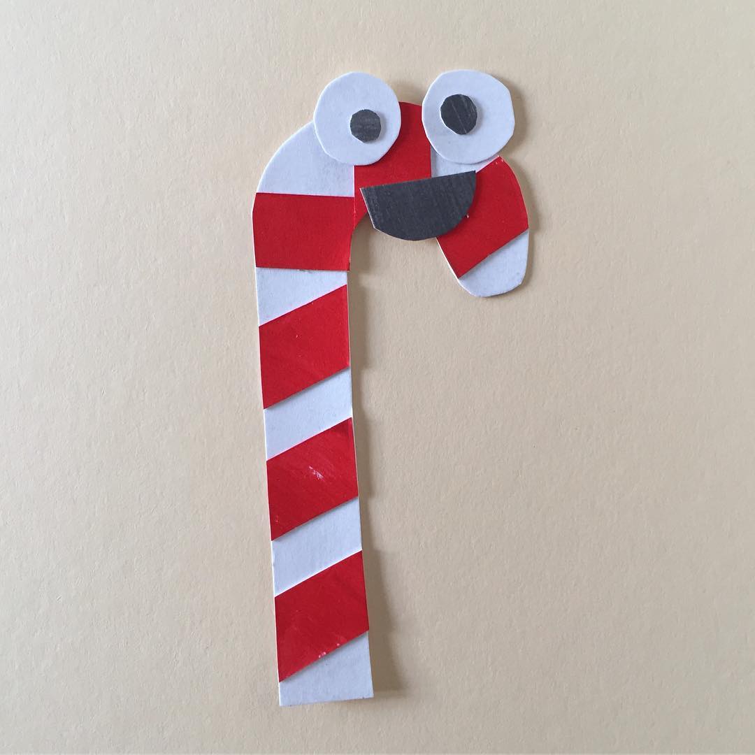 Paper cut Christmas candy cane.