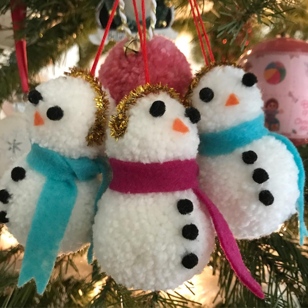 These pom pom snowmen might be favorite diy Christmas ornament .
