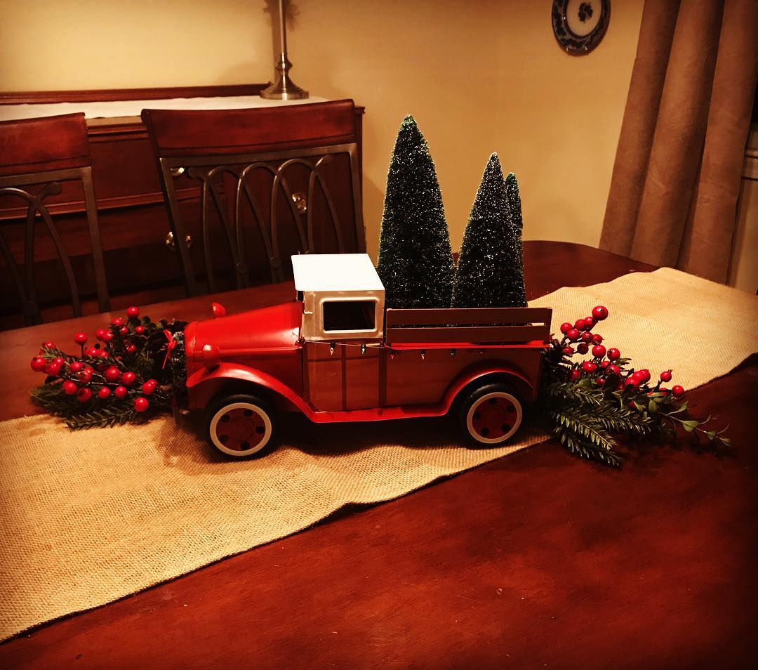 Christmas might be over but my centerpiece drives on christmas truck.