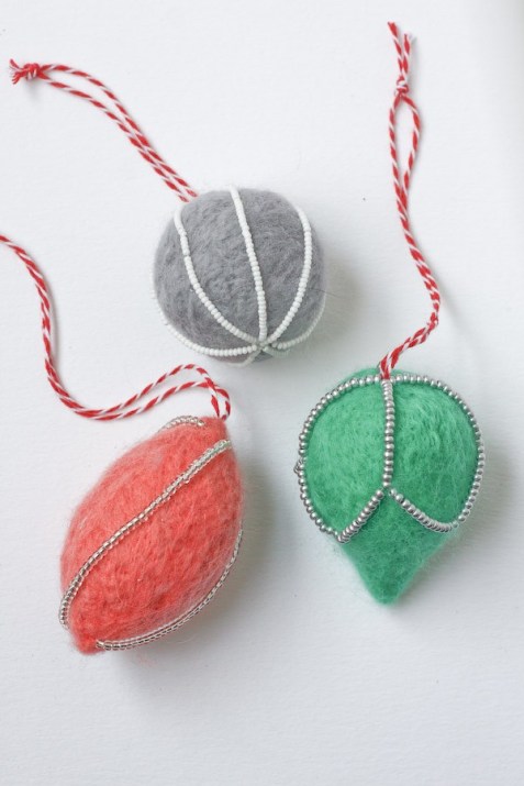 Colorful needles felt Christmas ornaments are really simple to make.