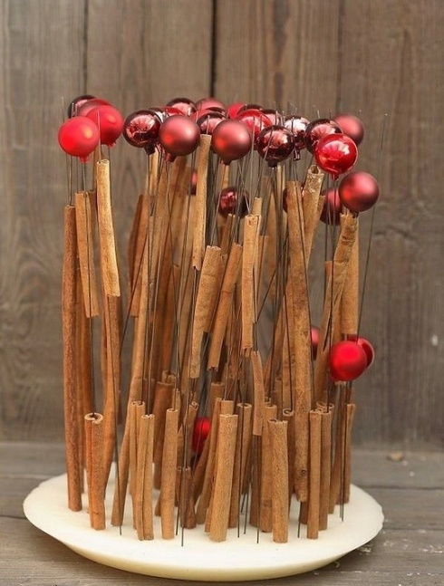 Lovely centerpiece made with cinnamon sticks.
