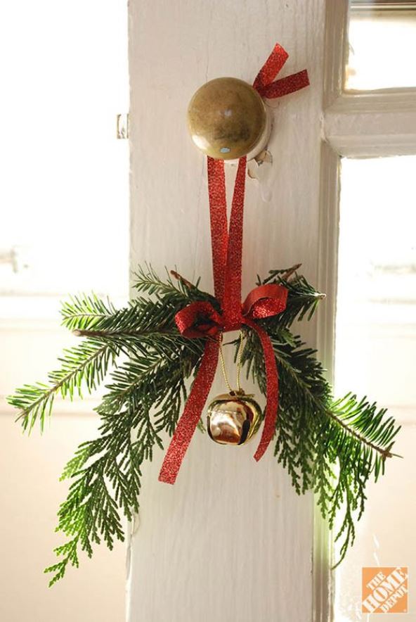 Make a stunning door know hanging with a shiny jingle bell.