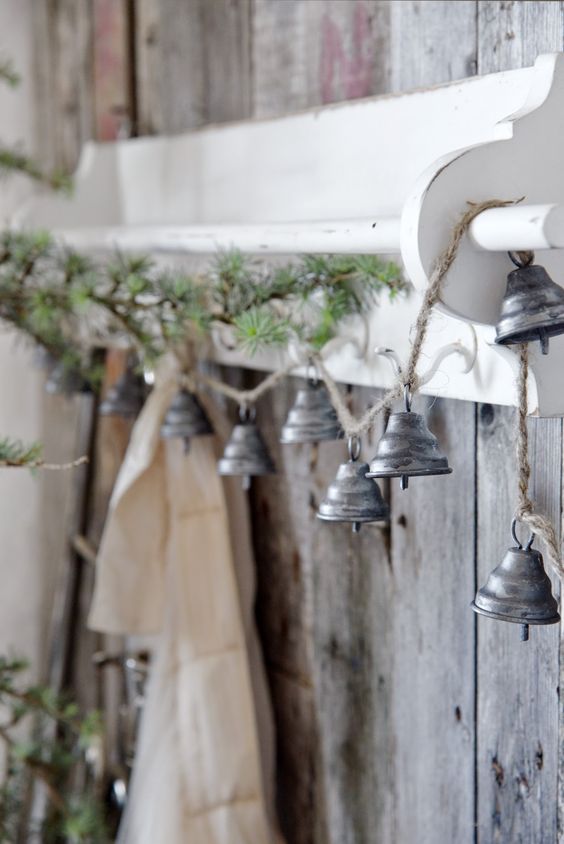 Rustic decor with old Christmas bells.