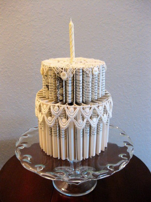 Create an interesting cake candle holder from RECYCLED book pages.
