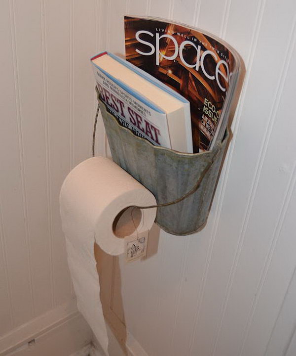 Metal basket was recycled as magazine and toilet paper holder.