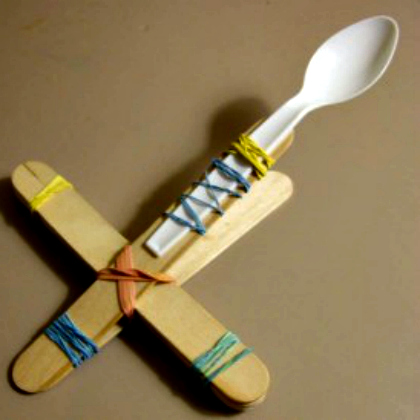 Plastic spoon catapult.