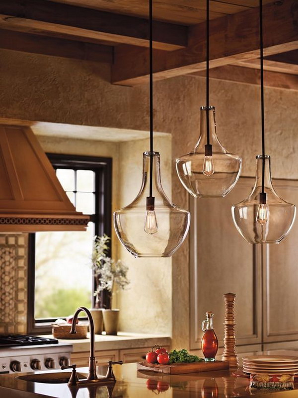 Rustic Kitchen Featuring Beautiful Clear Glass Pendant Lights.