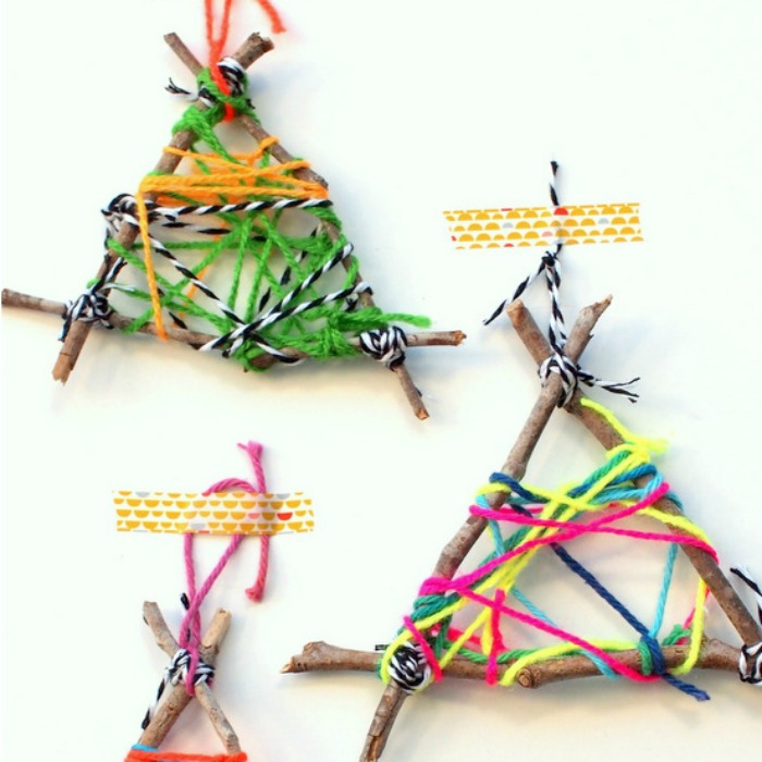 Stick and yarn ornaments are fun for kids. Stick Craft Ideas for Kids