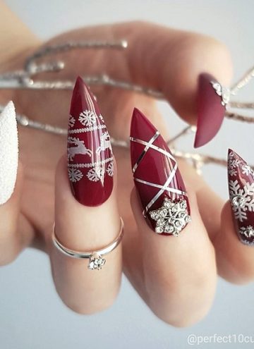 Stiletto winter bugundy nail design.