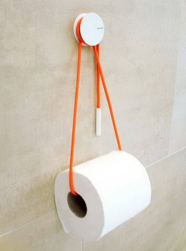 Use a rope to hold your toilet paper storage roll.