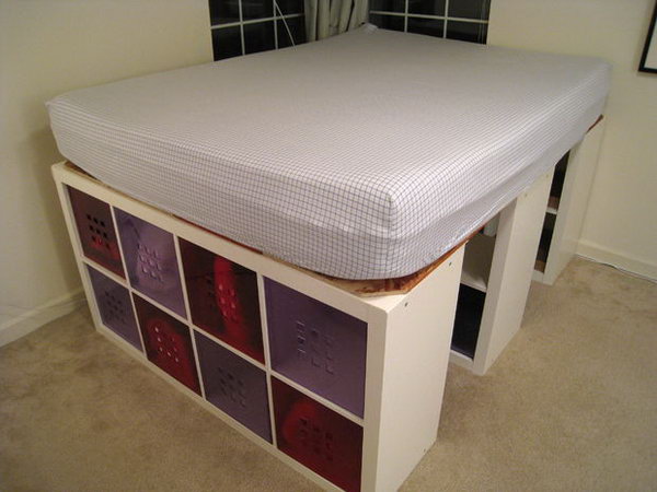 Bed with Expedit Bookshelves for Storage.