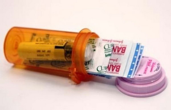 DIY Mini First-aid Kit Using a Prescription Bottle.