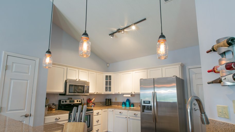 Existing pendant light sconces.