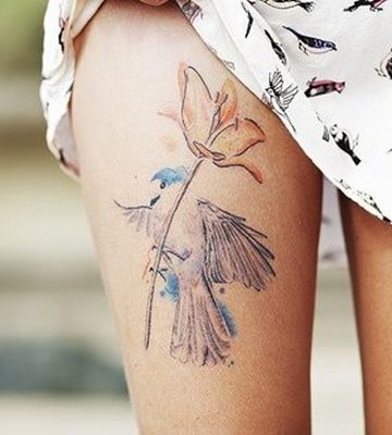 A bird carrying a flower. Isn’t it very interesting.