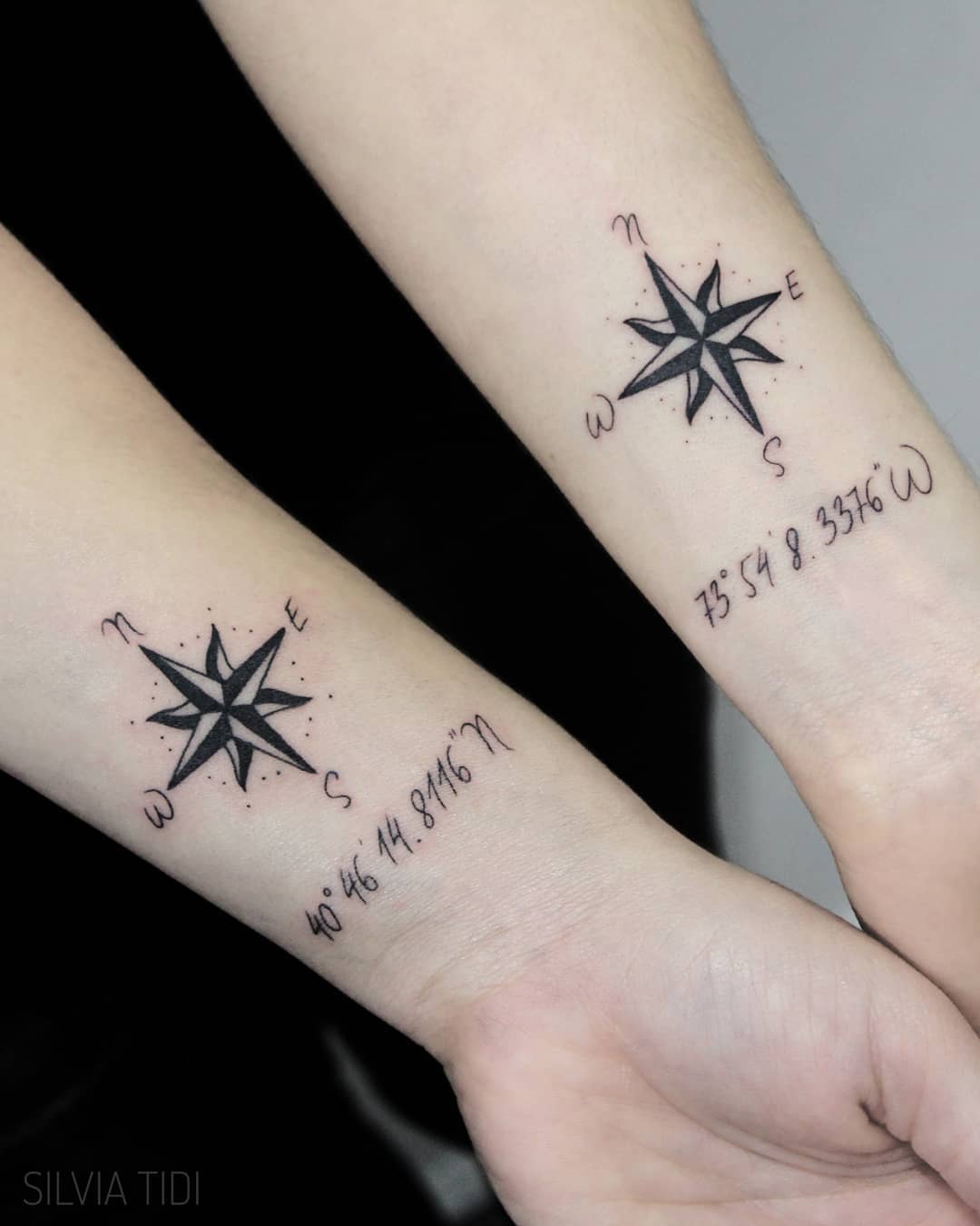 Compass and coordinate tattoo.
