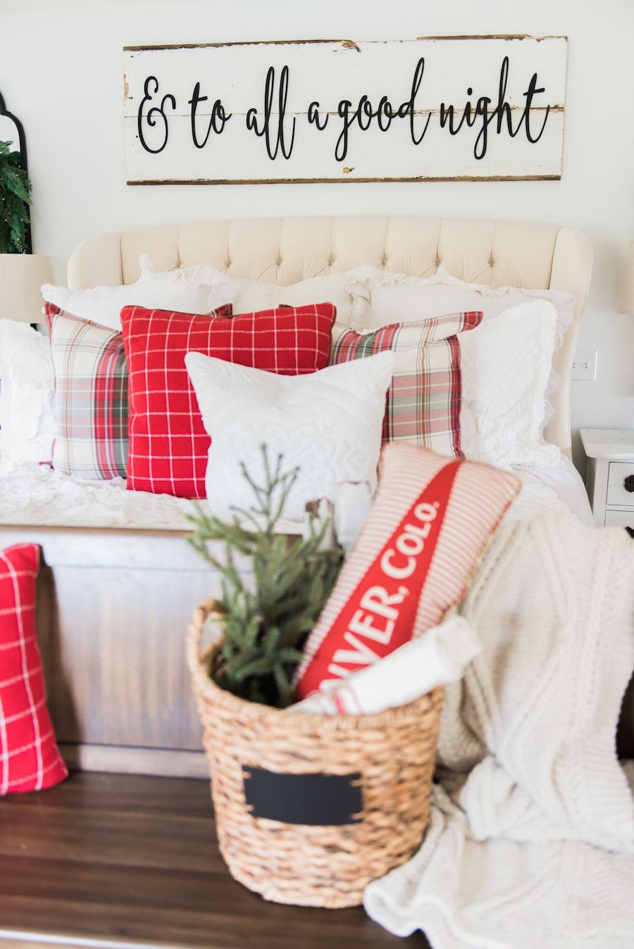 Christmas Bedroom with plaid throw pillows.
