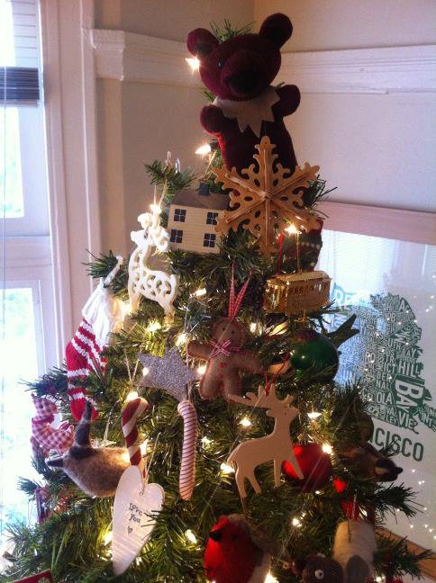 Christmas tree topper is a Grateful Dead bear.