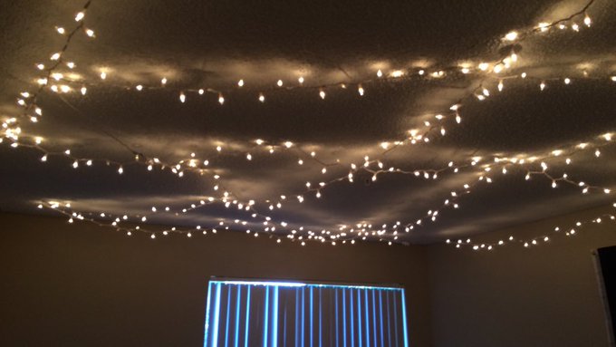 Hang Christmas lights on the ceiling.