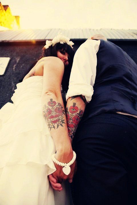 Matching love tattoos on your wedding day.