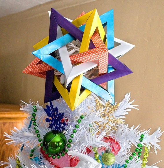 This bright origami star makes an impact on your tree.