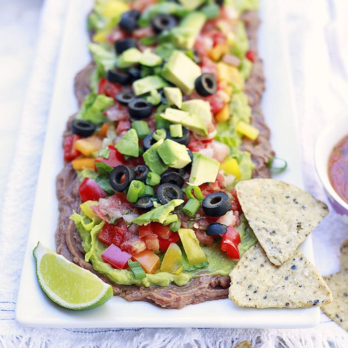 VEGAN LAYERED BEAN DIP BY YUMMY MUMMY KITCHEN