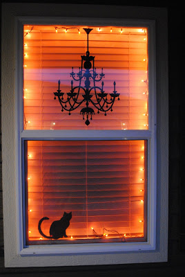 Easy Spooky Scene from a Chandelier Decal and a Black Cat Silhouette.