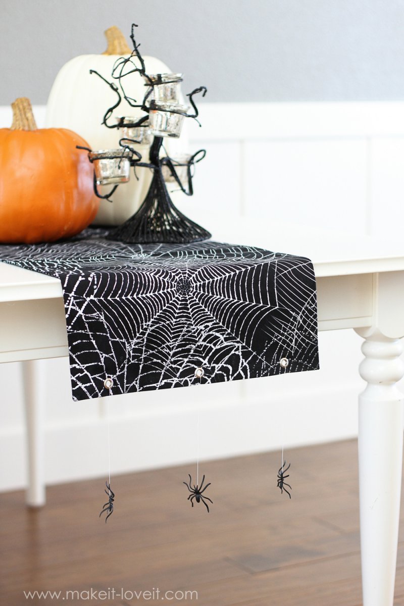 Halloween Table Runner with Hanging Spiders.